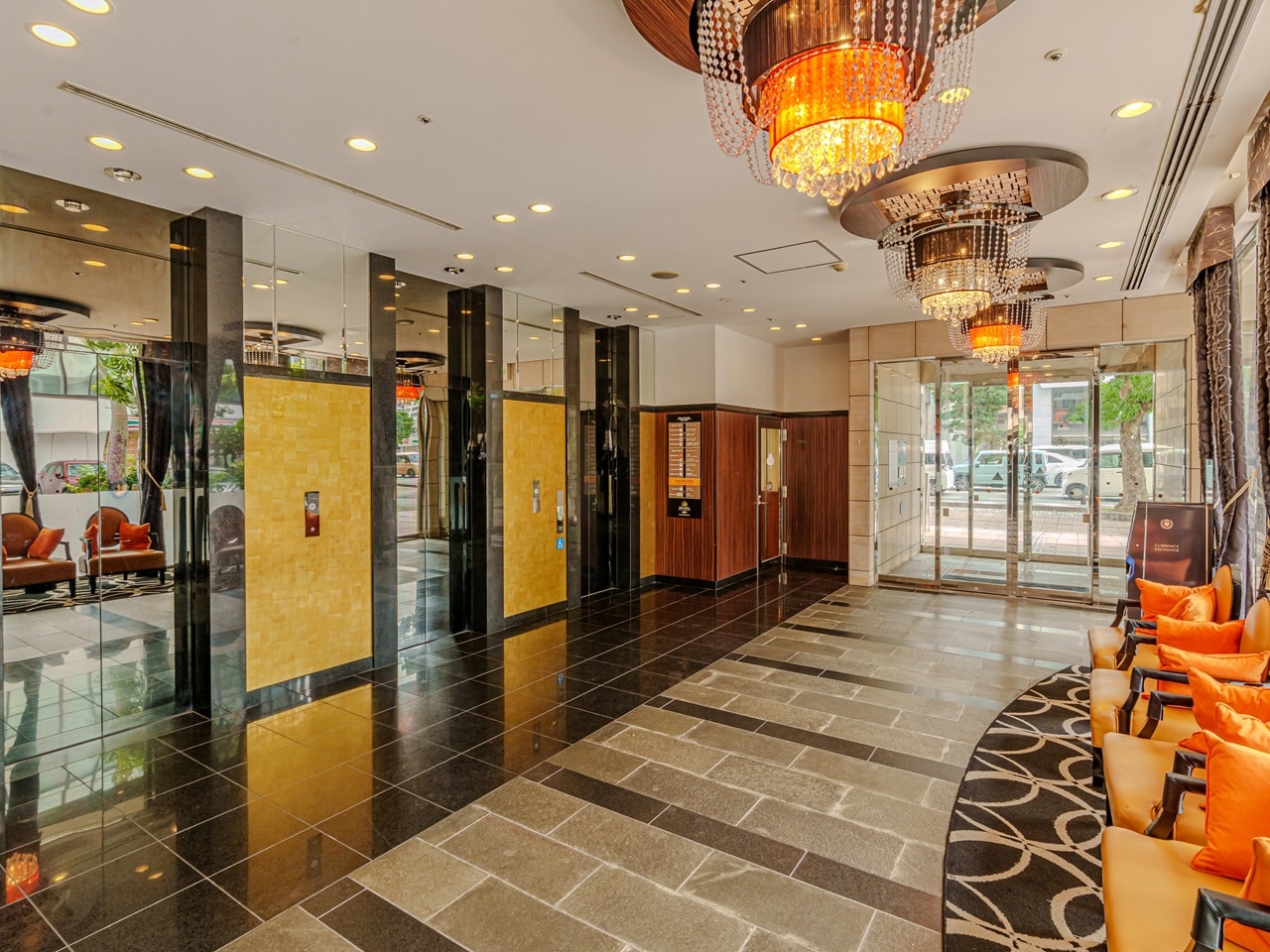 Luxury spacious hotel lobby warmly welcomes you (3 elevators equipped).