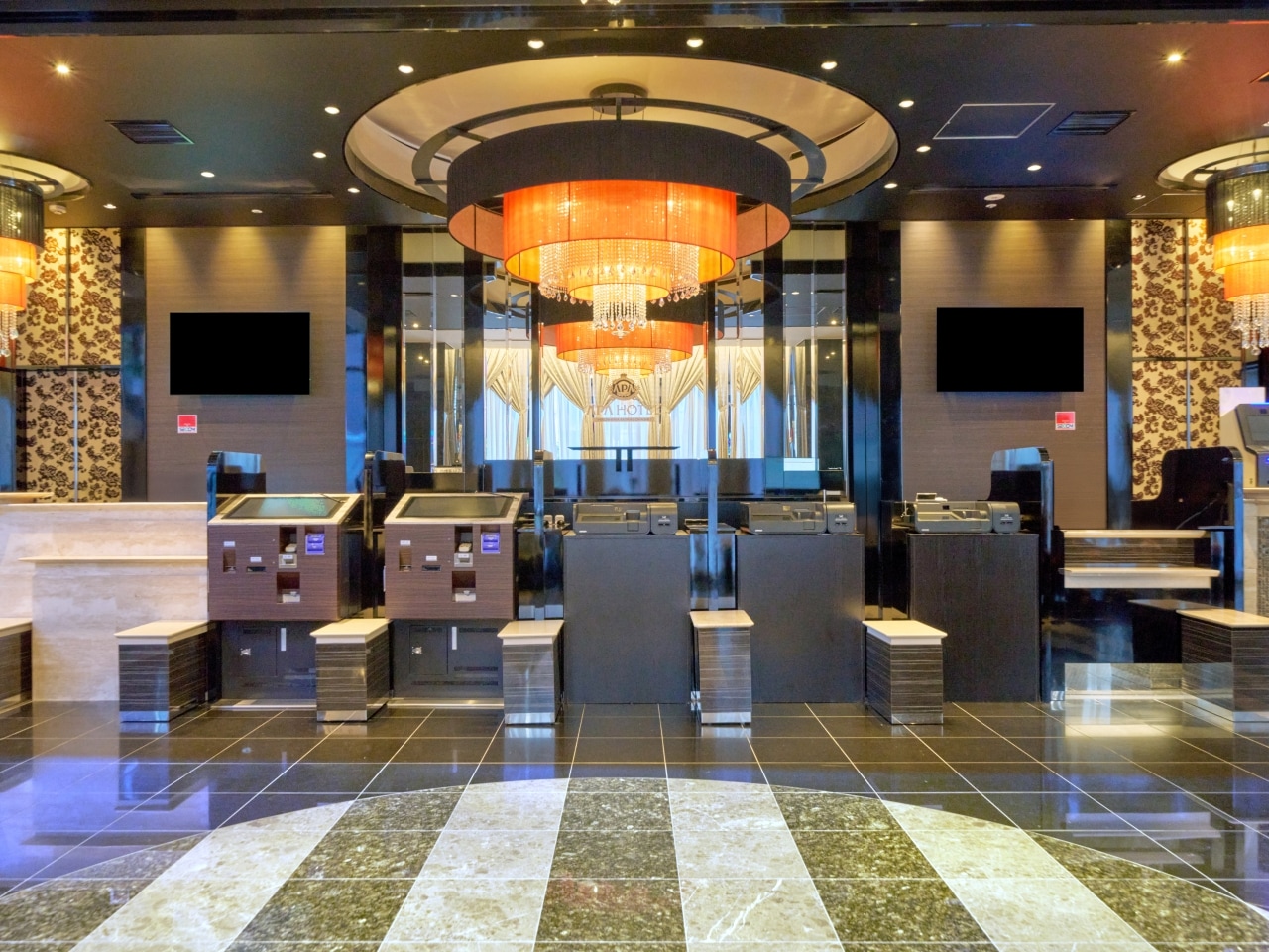 Luxury spacious hotel lobby warmly welcomes you.
