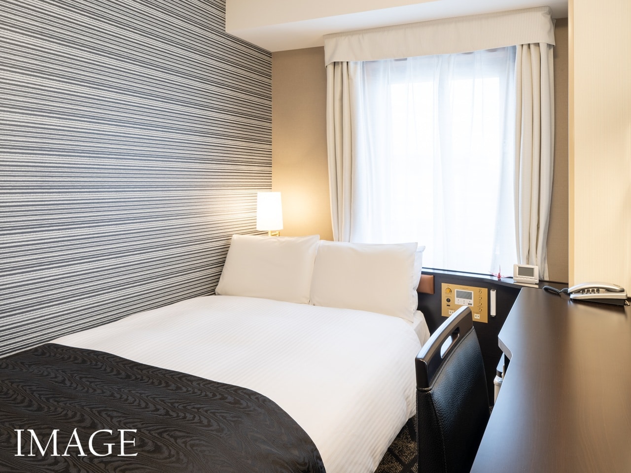 Corner Room (Single Bed / Small Double Bed) with Baggage Space