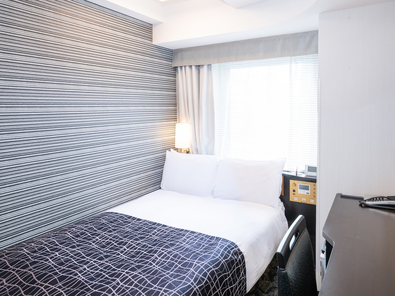 Corner Room (Single Bed / Small Double Bed) with Baggage Space