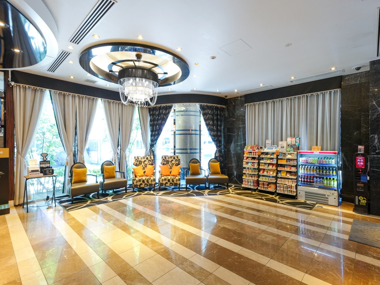 Luxury spacious hotel lobby warmly welcomes you (2 elevators equipped).