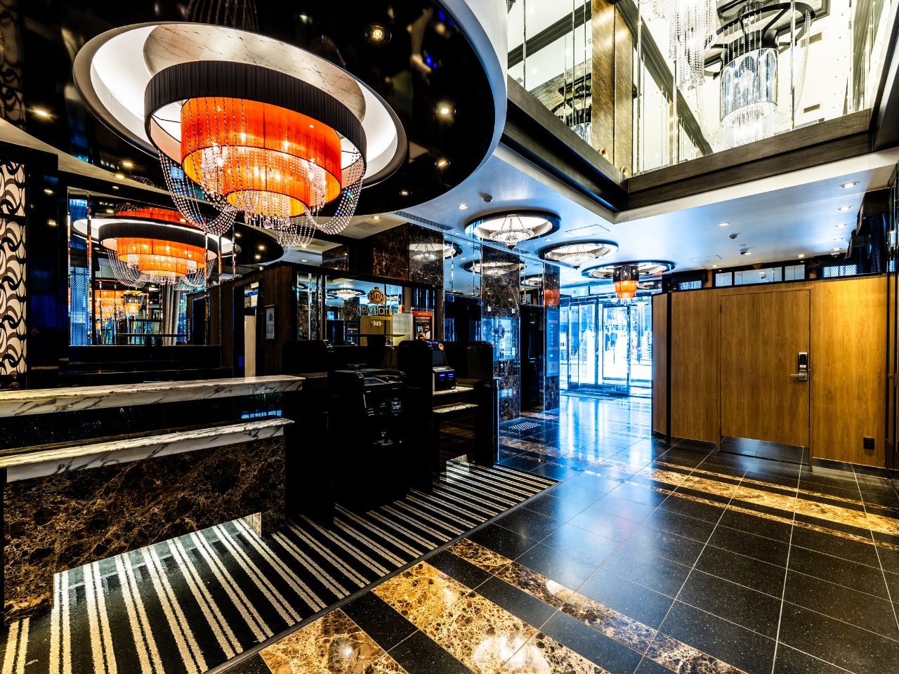 Luxury spacious hotel lobby warmly welcomes you (2 elevators equipped).