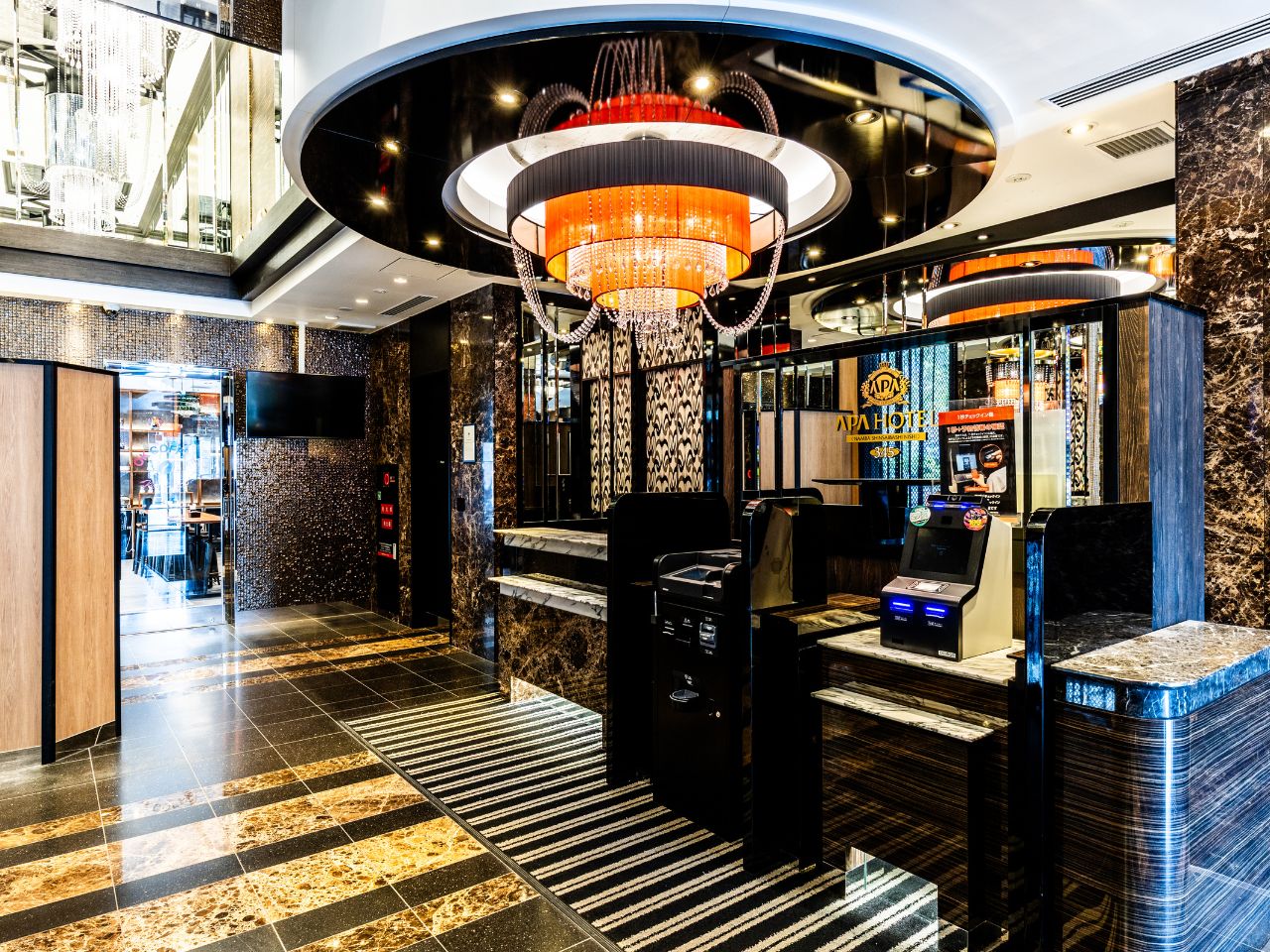 Luxury spacious hotel lobby warmly welcomes you (2 elevators equipped).