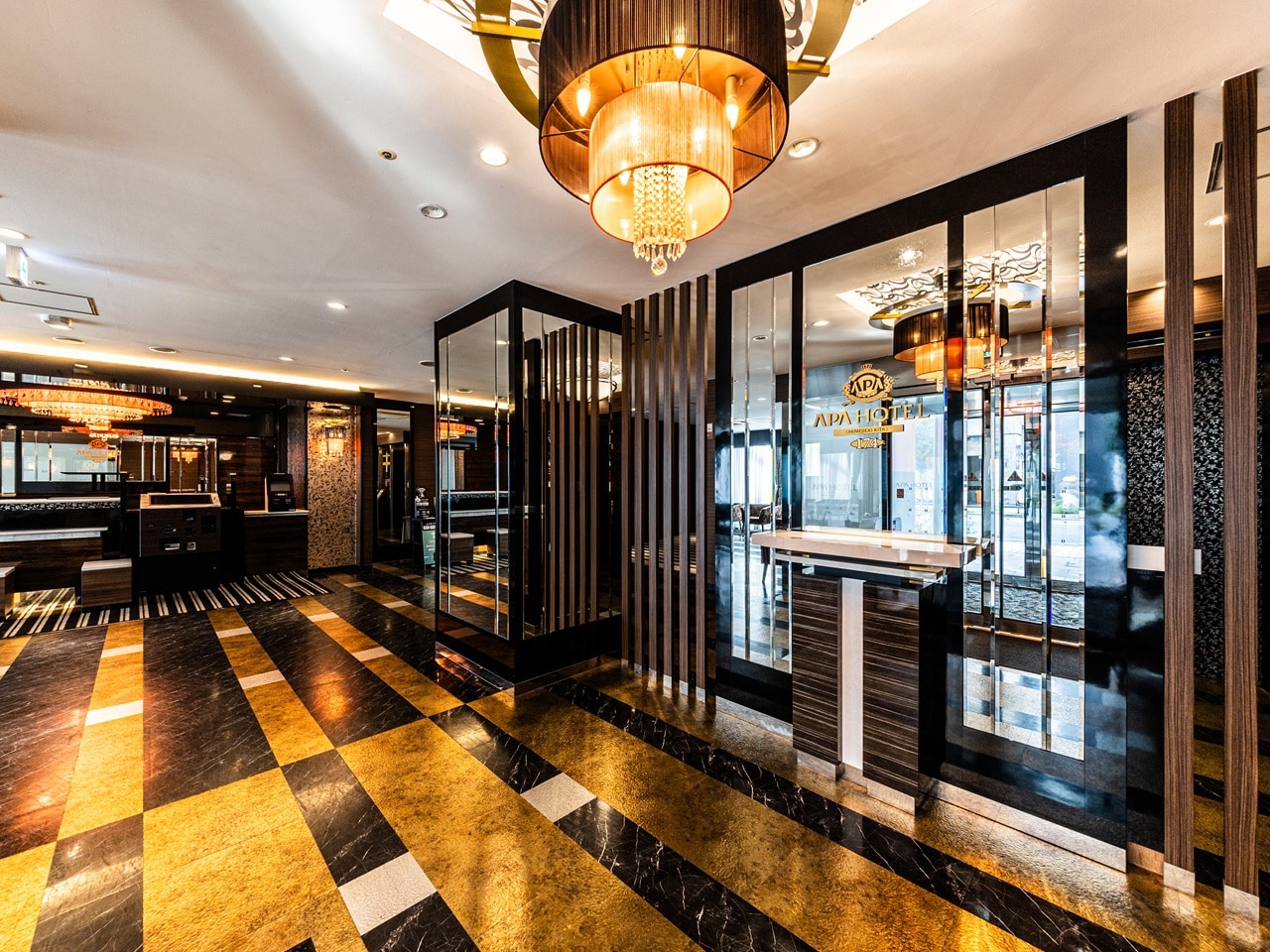 Luxury spacious hotel lobby warmly welcomes you (2 elevators equipped).