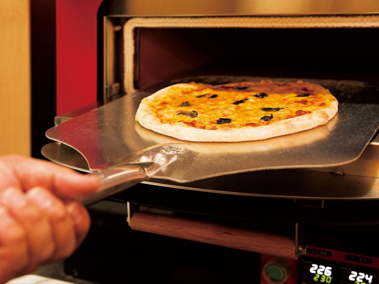 Locally produced, locally sourced oven-baked pizzas that change monthly