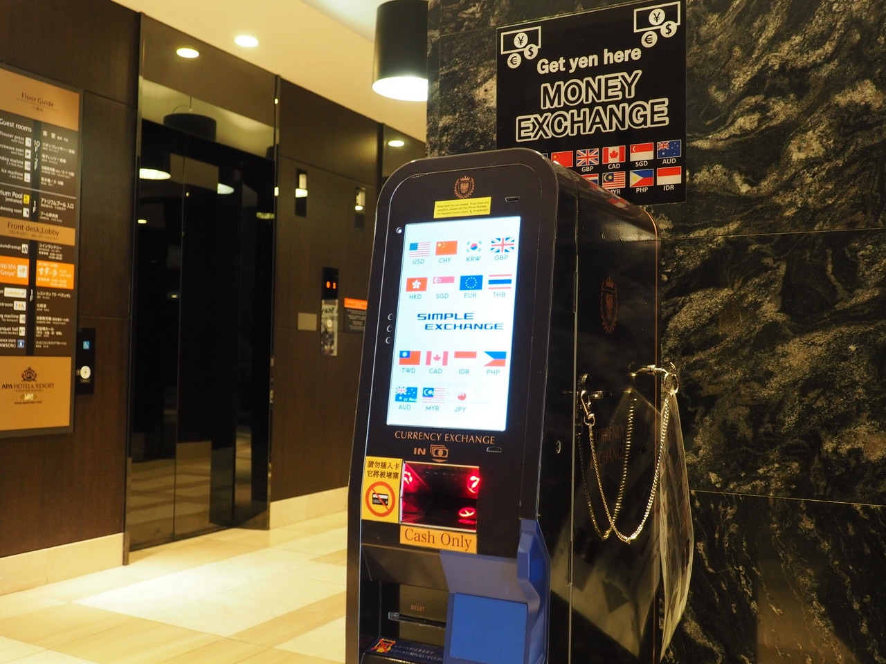 A currency exchange machine is located in the lobby on the 1st floor.
